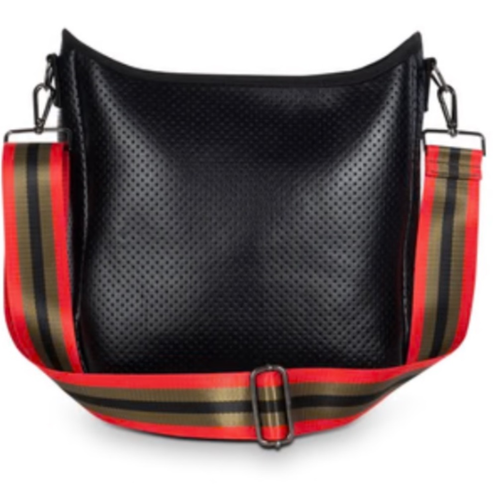The purse is very unique with red ,green and black stripes . Very soft leather .